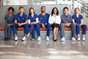 Happy Nurses sitting on a bench